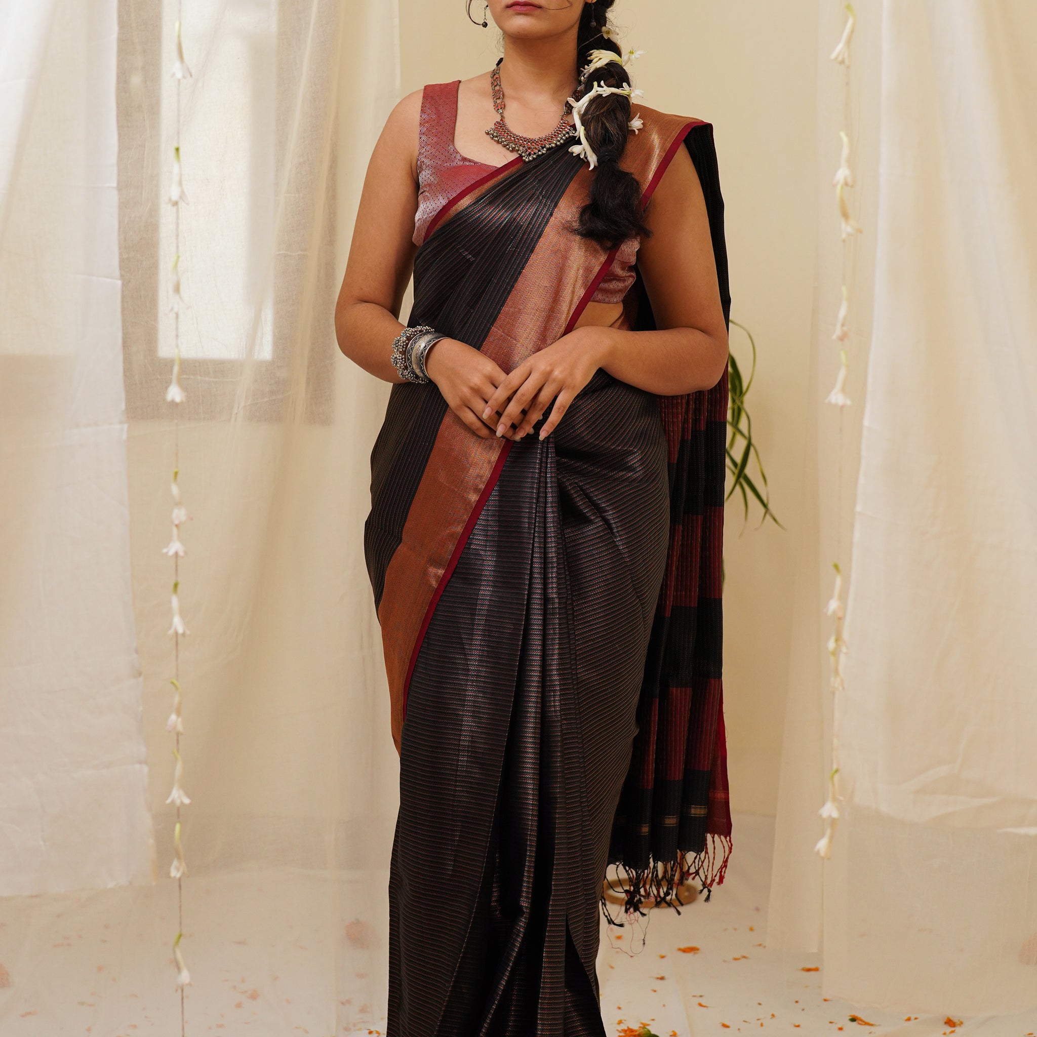 Dark Black Handwoven Zari Pattern All Over Maheshwari Saree with Striped Palla and Multicolour Border